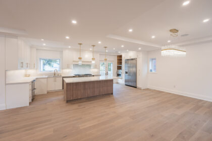 A modern kitchen renovation completed by Lucky5Group, featuring custom design details.